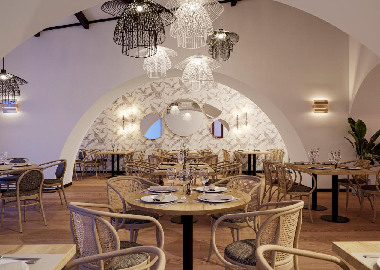 Hospes Palacio De Arenales & Spa Caces Exterior foto Restaurant interior